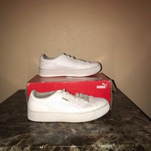 White and gold puma shoes